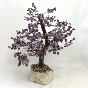 One Amethyst Indian Tree - large tree with purple stone leaves, brown branches, and a white rock base - on a white background
