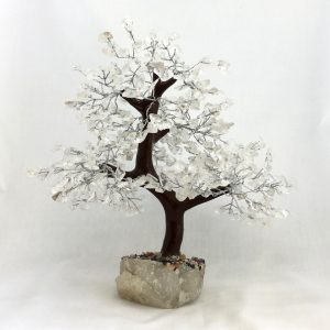 One Rock Crystal Indian Tree - large tree with transparent stone leaves, brown branches, and a white rock base - on a white background