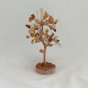One Carnelian Chinese Tree - orange stone leaves, copper wire branches, pink rounded base - on a white background
