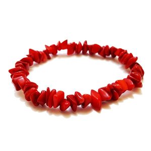 Coral Chip Bracelet viewed from the side - bright red chips - on a white background