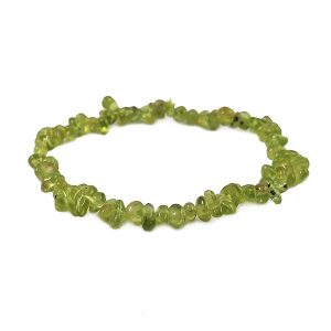 Side view of Peridot Chip Bracelet - translucent green chips - on a white background