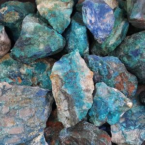 Close up of Chrysocolla Rough rock - stones of turquoise, blue, grey and brown.
