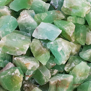 Close up of Calcite (Green) Rough - chunks of rock with a bright green colour