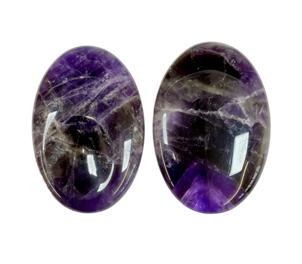 Two Banded Amethyst Thumb Stones - purple with white banding - on a white background