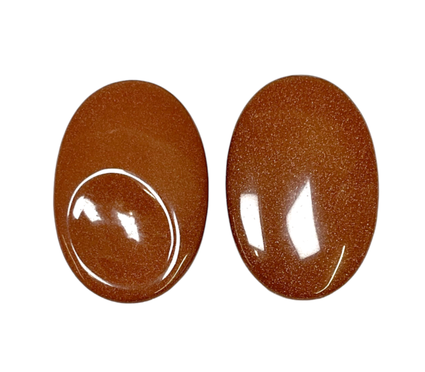 Two Brown Goldstone Thumb Stones - brown with copper flecks - on a white background