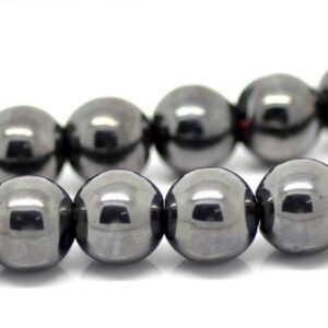 Close up of Haematin Round Beads - metallic chrome coloured spheres.
