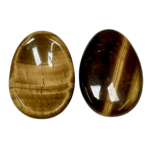 Two Tiger Eye Worry Stones - brown with gold banding - on a white background