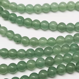 Close up of Aventurine Round Beads - green coloured spheres.