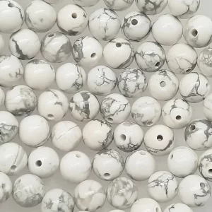 Close up of Howlite Round Beads - white with grey veining coloured spheres.