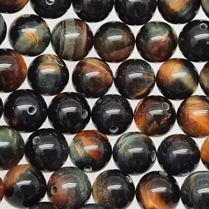 Close up of Tiger Eye (Mixed) Round Beads - bands of gold, blue and black coloured spheres.