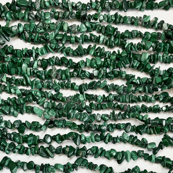 High volume of rows of Malachite chip necklaces - green