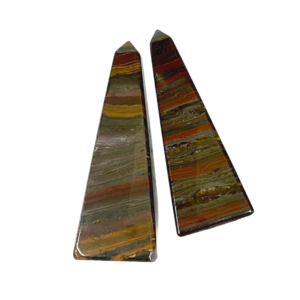 Two Tiger Iron Obelisks - four sided tall point in banded red, brown and yellow stone with some inclusions - on a white background