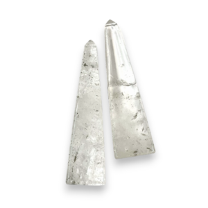 Two Crystal Obelisks - four sided tall point in clear stone with some inclusions - on a white background