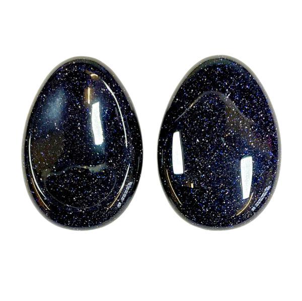 Two Blue Goldstone Worry Stones - blue with copper flecks - on a white background