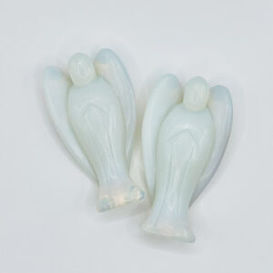 Two Opalite Angels Large viewed from behind - opaque blue pearlescent glass - on a white background