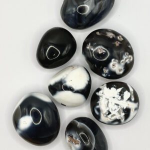 Group of Grey Agate Pebbles (dark grey with white blooms and patterns) on a white background
