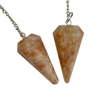 Example of two Sunstone Pendulums - orange and yellow - on a silver chain, on a white background