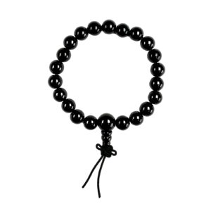 One Black Onyx power bracelet viewed from the top - black round beads with one larger bead - on a white background