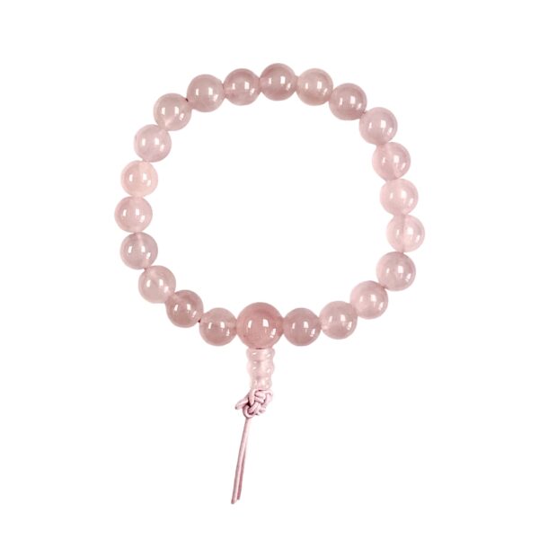One Rose Quartz power bracelet viewed from the top - pink round beads with one larger bead - on a white background