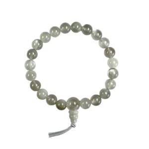 One Moonstone power bracelet viewed from the top - white and cream round beads with one larger bead - on a white background