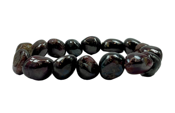 One Garnet Nugget bracelet from the side - irregular dark red beads - on a white background