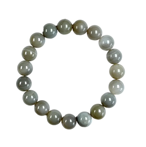 One 10mm round bead banded agate bracelet from the top - grey and white banded beads - on a white background