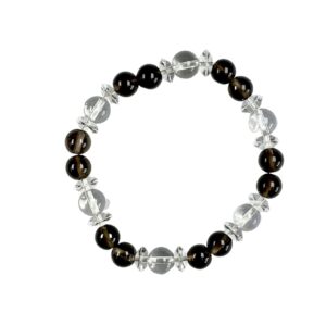 One Smoky Quartz abacus bracelet -alternating round and disc beads of dark grey and clear quartz - on a white background