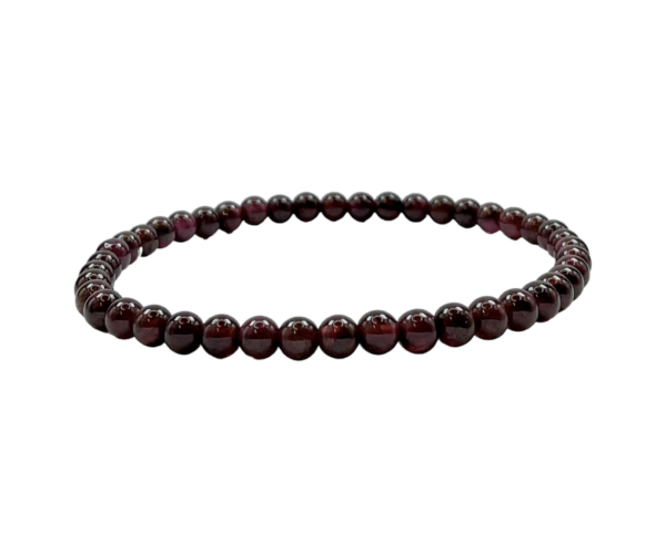 One 4mm round bead Garnet bracelet from the side - dark red banded beads - on a white background
