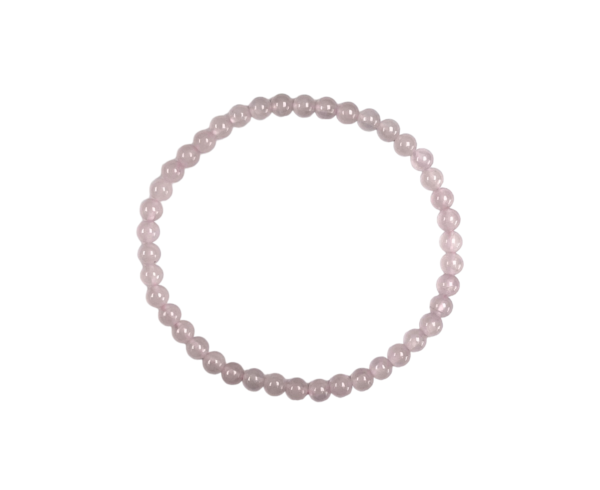 One 4mm round bead Rose Quartz bracelet from the side - small pale pink banded beads - on a white background