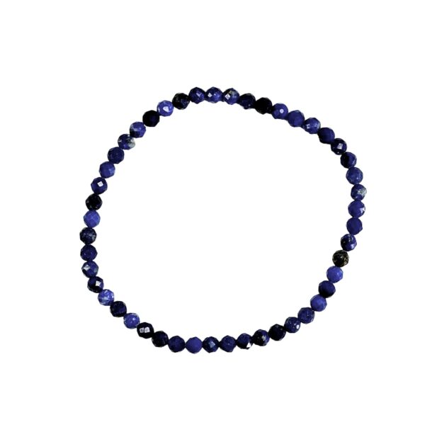 One 4mm faceted bead Lapis bracelet from the top - small dark blue beads - on a white background