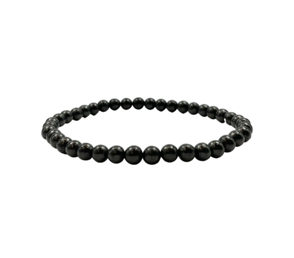 One 4mm round bead Shungite bracelet from the side - small grey beads - on a white background