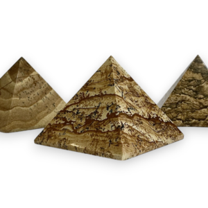 Three KPS pyramids - beige with black veining - on a white background