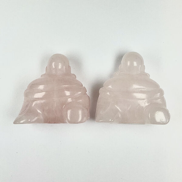 Two buddhas from the back - pink rose quartz - on a white background
