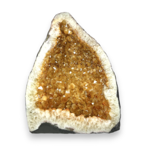Citrine Cave (1) shown from the side - half of a giant geode with orange points - on a white background