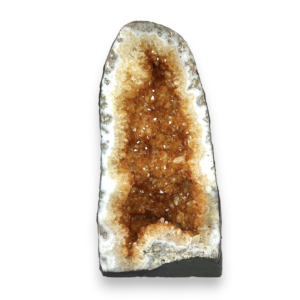 Citrine Cave (2) - half of a giant geode with orange points - on a white background