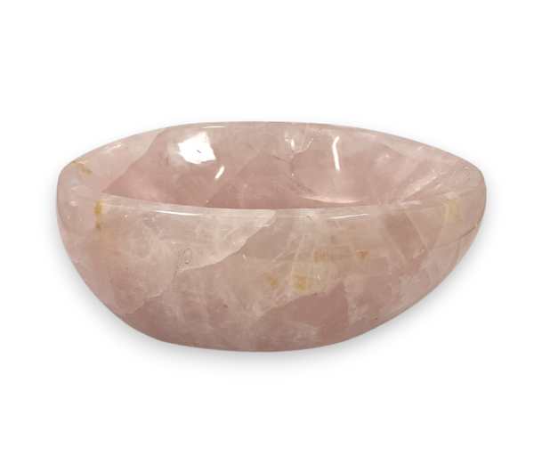 One Rose Quartz Bowl (B) from the side - pale pink extra large bowl with some translucent and orange areas - on a white background