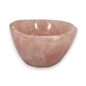 One Rose Quartz Bowl (D) from the side - pale pink extra large bowl with some translucent and orange areas - on a white background