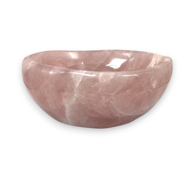 One Rose Quartz Bowl (E) from the side - pale pink extra large bowl with some translucent and orange areas - on a white background