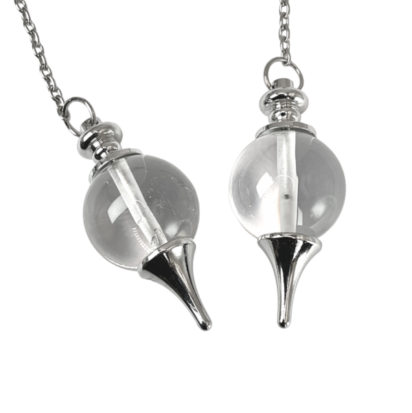 Example of two Crystal Ball Pendulums - 20mm transparent sphere in a silver holder - on a silver chain, on a white background