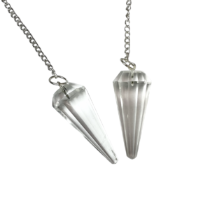 Example of two Crystal Pendulums - transparent stone - on a silver chain, on a white background