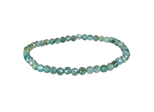 One 4mm faceted bead Apatite bracelet from the side - small blue and turquoise beads - on a white background
