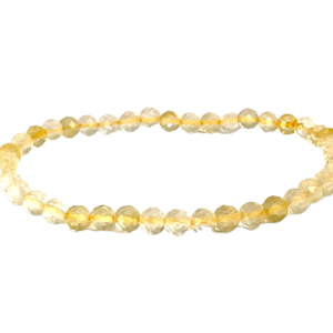 One 4mm faceted bead Citrine bracelet from the side - small yellow beads - on a white background