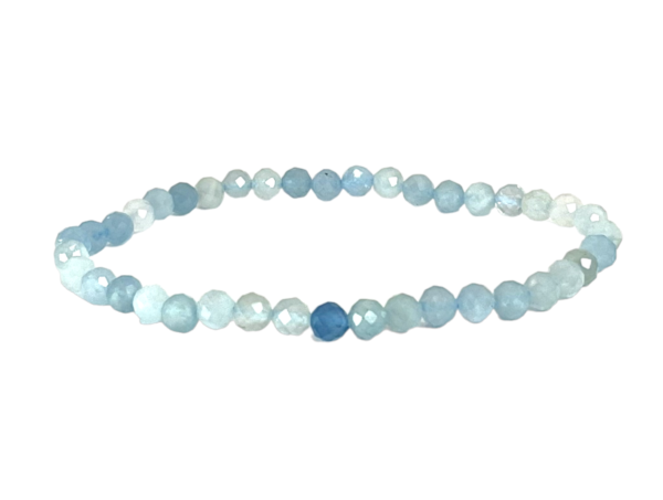 One 4mm faceted bead Aqua bracelet from the side - small blue and turquoise beads - on a white background