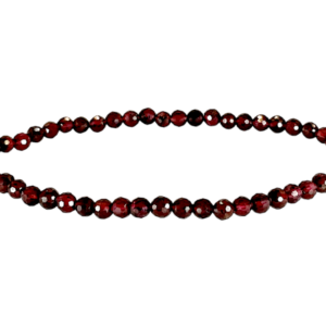 One 4mm faceted bead Garnet bracelet from the side - small red beads - on a white background