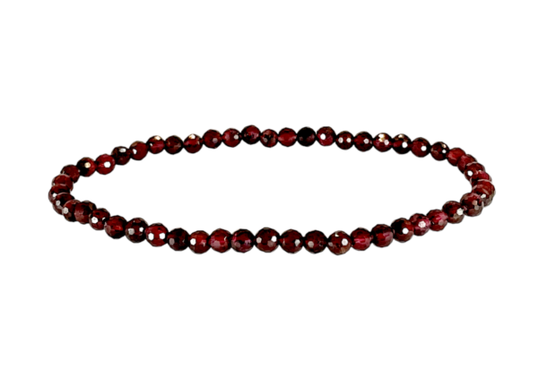 One 4mm faceted bead Garnet bracelet from the side - small red beads - on a white background