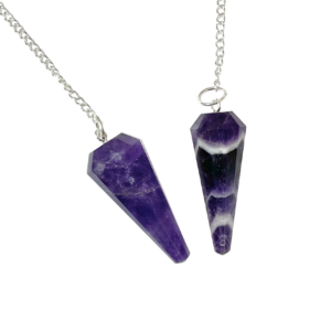 Example of two Amethyst Pendulums - dark purple with some white banding - on a silver chain, on a white background