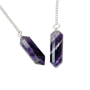 Example of two Amethyst DT Pendulums - purple stone carved into a two pointed rod - on a silver chain, on a white background