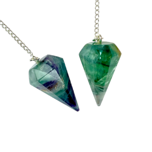 Example of two Fluorite (Rainbow) A Grade Pendulums - purple and green stone - on a silver chain, on a white background