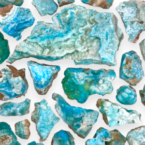 Large selection of Rough Aragonite (Blue) - teal, seafoam green, blue chunks of bright rock - on a white background.