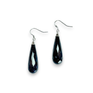 One pair of Blue Goldstone Faceted Pear Drop Earrings - elongated blue goldstone faceted teardrop stones with sterling silver hooks - on a white background
